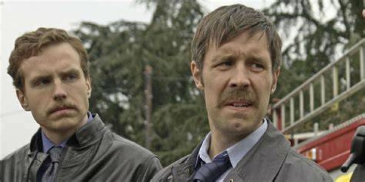 Wainwright and Cartwright talking to Angel in Hot Fuzz