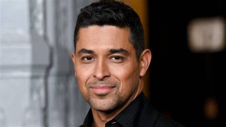 Wilmer Valderrama smirking
