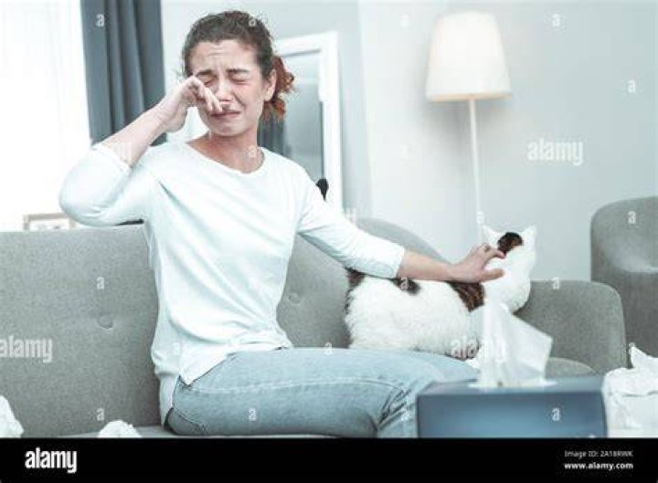 woman allergic to cat