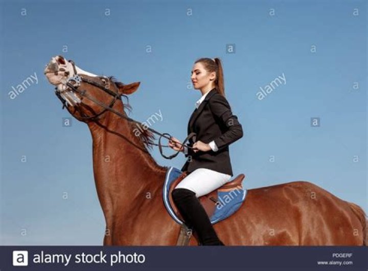 woman riding a horse