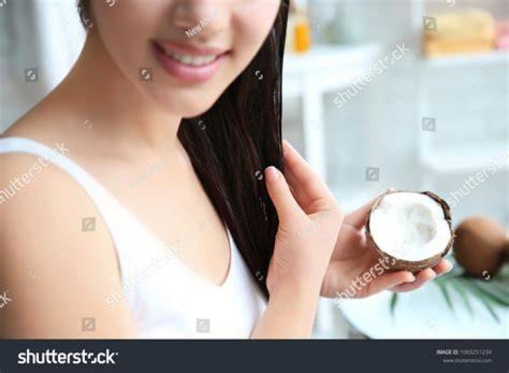 Woman with coconut oil 