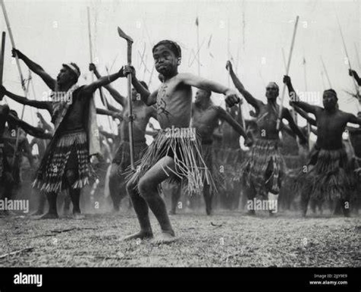 Young Maori show off a haka